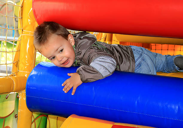 istock boy in the children's play soft small town 518503743