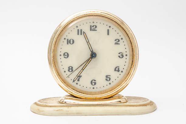 istock retro alarm clock isolated on white 518504294