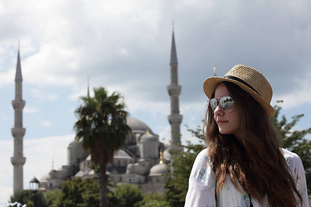istock Woman on the Blue Mosque background 518506696