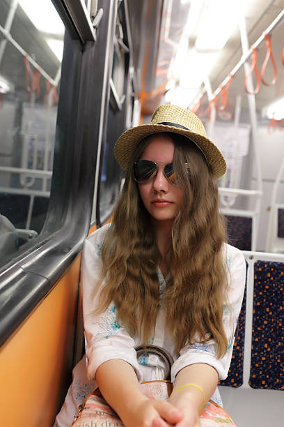 istock Girl in subway train 518507022
