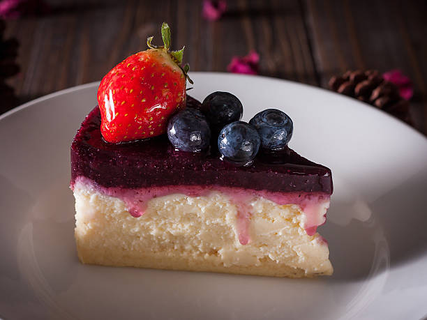 istock blue berry cheesecake on white background 518507892