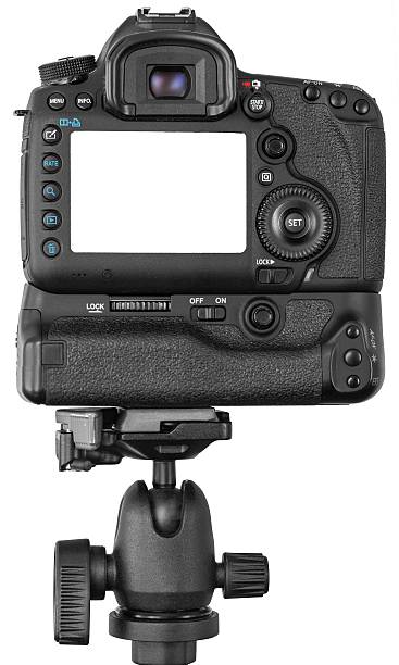 istock DSLR camera on tripod isolated on white 518508304