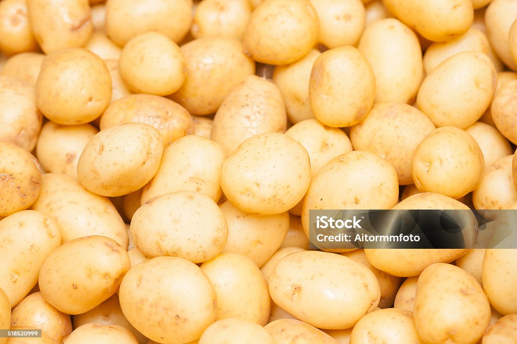 Background potatoes Close-up of a fresh raw potatoes background Raw Potato Stock Photo