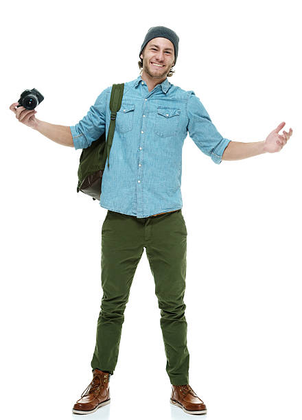 istock Smiling photographer holding slr camera 518521021