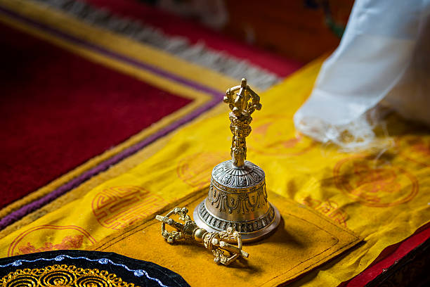 Tibetan bell and Vacra (also called Dorje or thunderbolt) in a buddhist monastery. Vajra is a Sanskrit word meaning both thunderbolt and diamond.