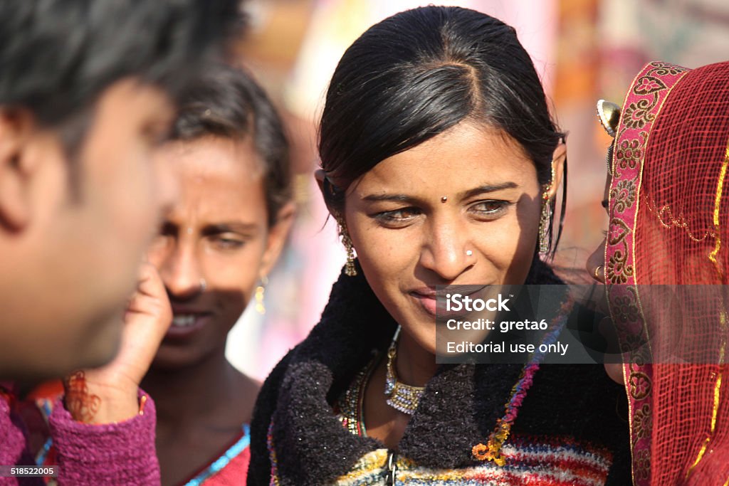 Beautiful Indian girl Pushkar, India, November 28, 2012: Beautiful Indian girl smiling at Pushkar fair, in the Indian Rajasthan state Adult Stock Photo