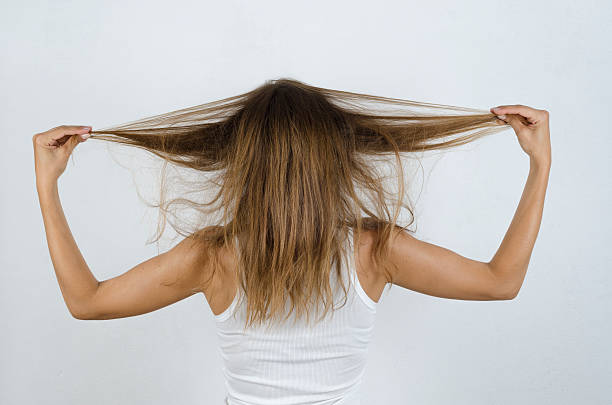 istock Young girl puts her hair 518522570