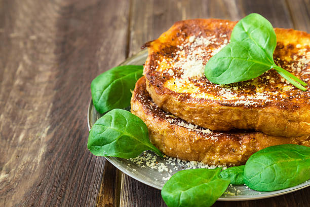 istock Savory french toasts with parmesan cheese and spinach 518522646