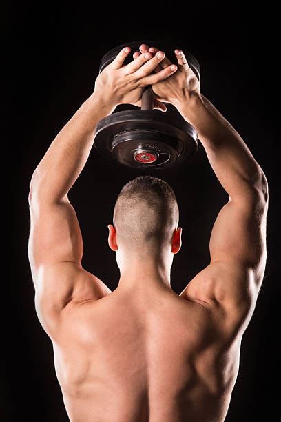 bodybuilder - human muscle men weights picking up - fotografias e filmes do acervo