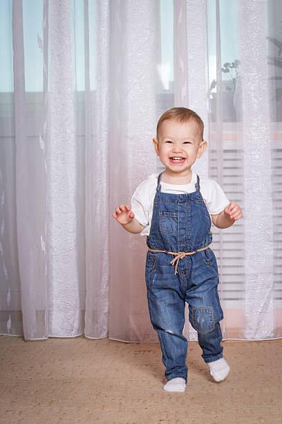 istock Child running around the room with joy 518524954