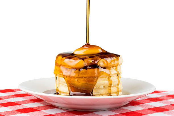 frühstückswaffeln - waffle syrup pouring breakfast stock-fotos und bilder