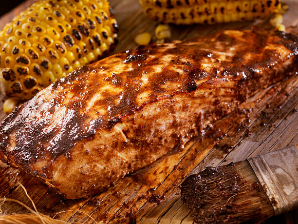 BBQ Grilled Halibut with Jerk BBQ Sauce BBQ Grilled Halibut with Jerk BBQ Sauce and Corn- Photographed on Hasselblad H3D2-39mb Camera freshwater bass stock pictures, royalty-free photos & images
