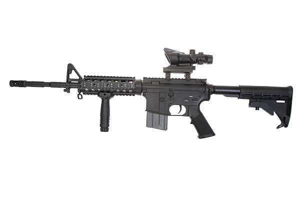 istock Colt M4A1 isolated on a white background 518526065
