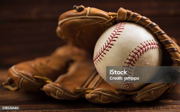 Leather Baseball Glove And Ball On A Wooden Bench Stock Photo - Download Image Now - Baseball - Ball, Baseball - Sport, Baseball Glove