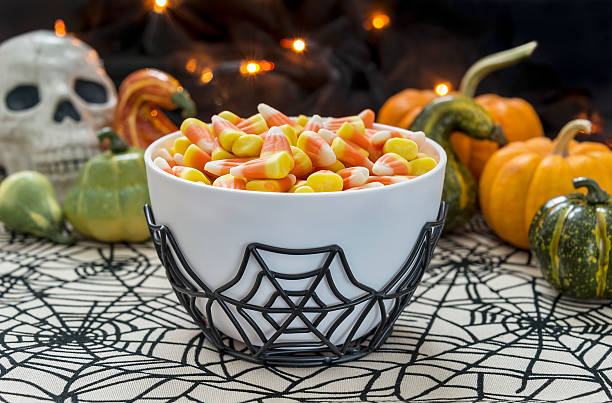 istock Bowl of candy corn with a Halloween theme 518527317