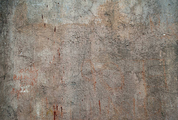 istock Texture of old wall covered with gray stucco 518528353
