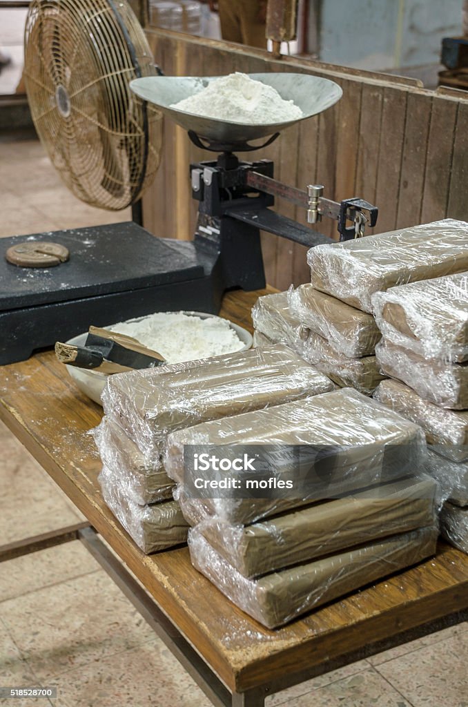 Cocaine packets This is a scene arranged by photographer to recreate an illegal warehouse.  Cocaine Stock Photo