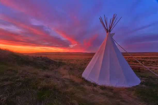 This photo was taken in the Grassland National Park, Saskatchewan, Canada. The tipi of aboriginal peopole  is the symbol of this land.