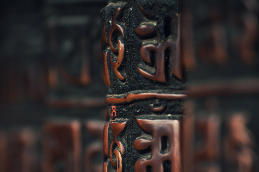 Close-up of rolls of prayer in Buddhist temples in Nepal