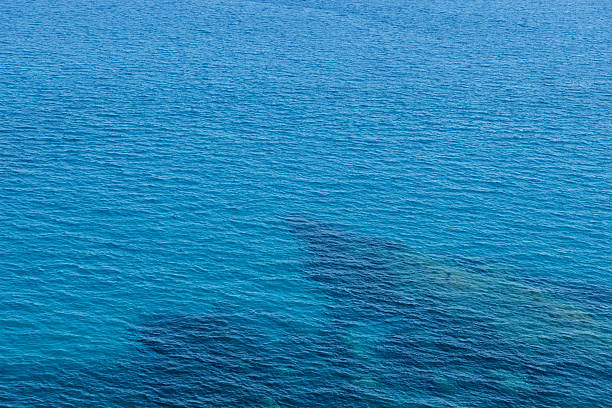 istock Blue clear sea water, Sardinia, Italy 518530874
