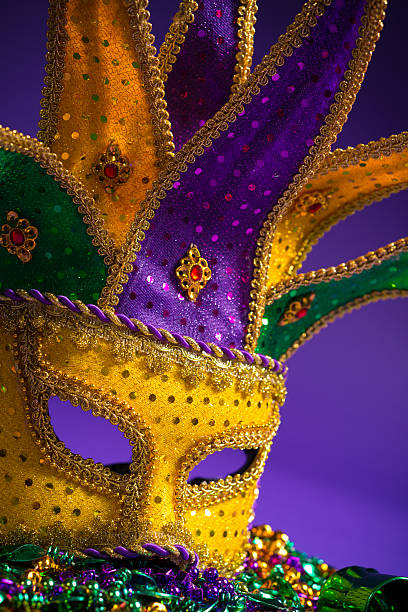 istock Assorted Mardi Gras or Carnivale mask on a purple background 518531656