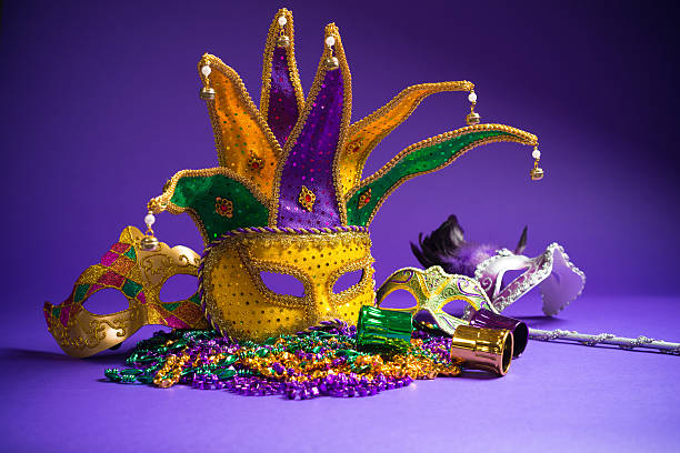 istock Assorted Mardi Gras or Carnivale mask on a purple background 518531682