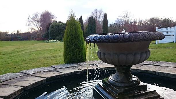 Fountain with a background A fountain in Mercure Letchworth Hall Hotel letchworth garden city stock pictures, royalty-free photos & images