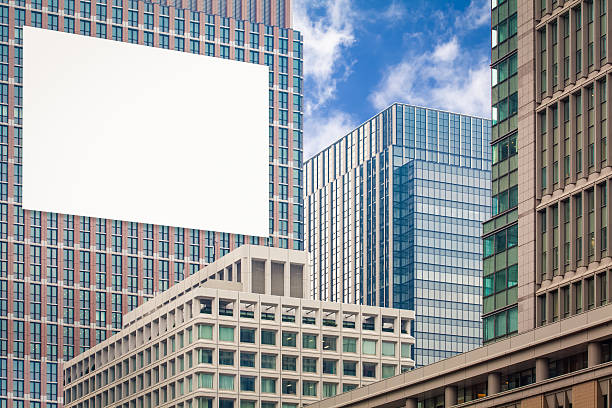 istock Blank big billboard at high office building 518535140