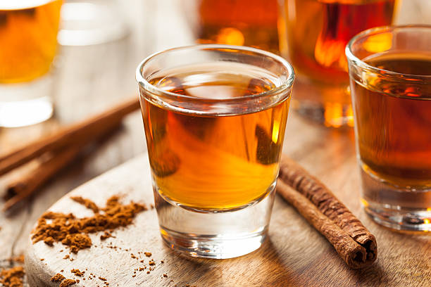 istock Cinnamon Whiskey Bourbon in a Shot Glass 518536240