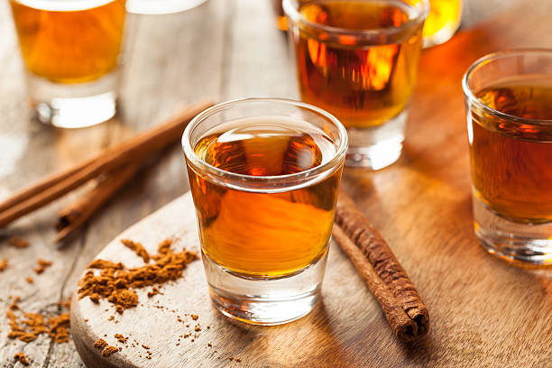 istock Cinnamon Whiskey Bourbon in a Shot Glass 518536284