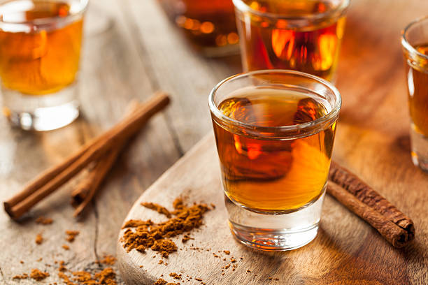 istock Cinnamon Whiskey Bourbon in a Shot Glass 518536302