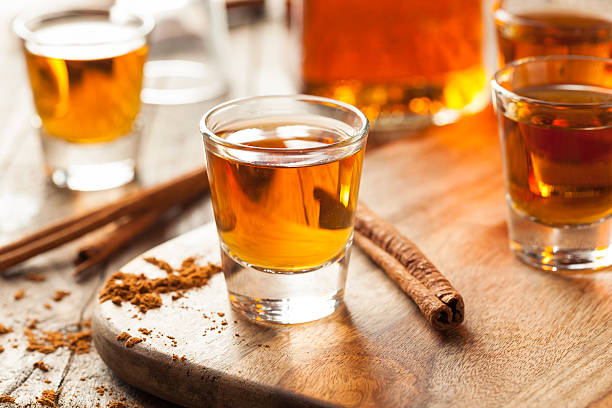 istock Cinnamon Whiskey Bourbon in a Shot Glass 518536380
