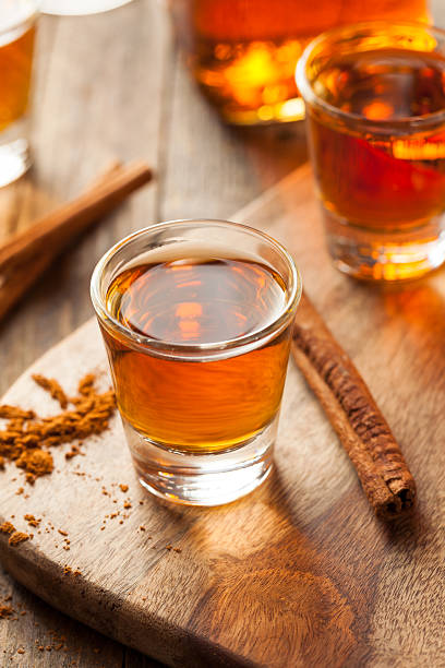 istock Cinnamon Whiskey Bourbon in a Shot Glass 518536446