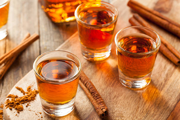 istock Cinnamon Whiskey Bourbon in a Shot Glass 518536486