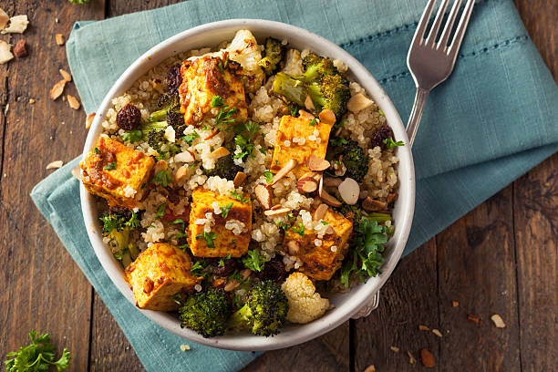 Homemade Quinoa Tofu Bowl Homemade Quinoa Tofu Bowl with Roasted Veggies and Herbs tofu photos stock pictures, royalty-free photos & images