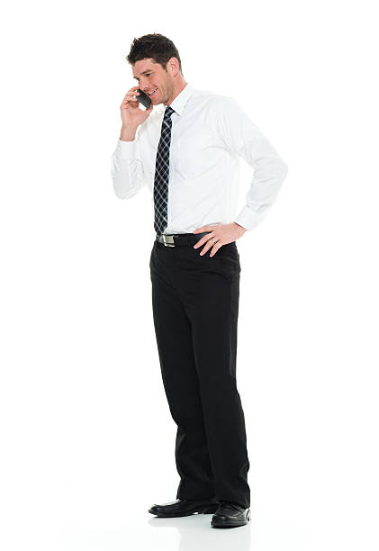 istock Smiling businessman talking on phone 518537052