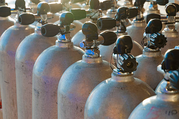 istock Line of scuba diving air tanks, flared image 518537428