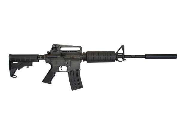 istock rifle with silencer isolated on a white background 518546421