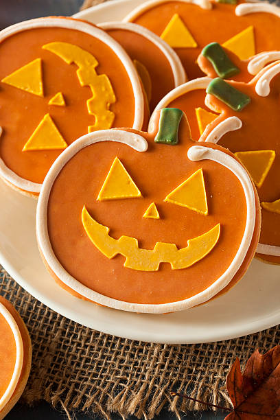 istock Homemade Jack O'lantern Pumpkin Cookie 518547039