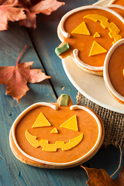 istock Homemade Jack O'lantern Pumpkin Cookie 518547051