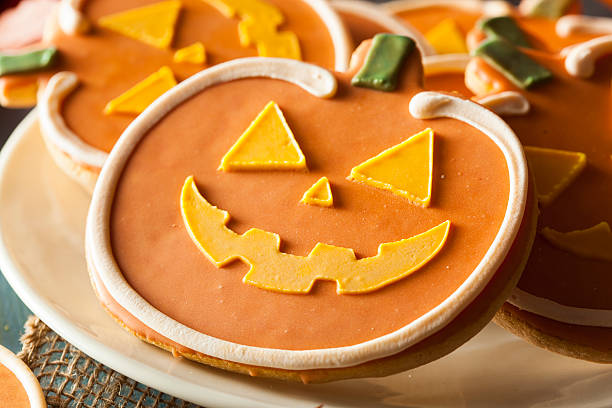 istock Homemade Jack O'lantern Pumpkin Cookie 518547069