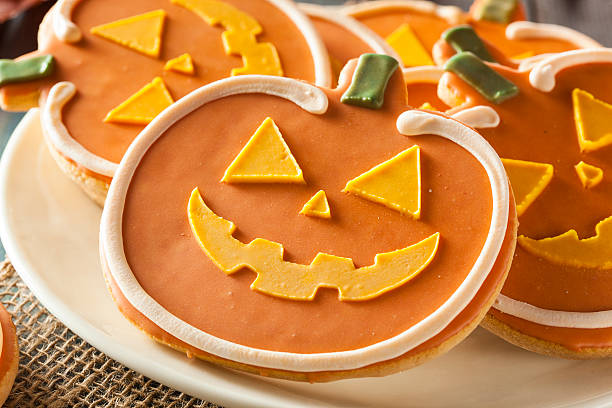 istock Homemade Jack O'lantern Pumpkin Cookie 518547087