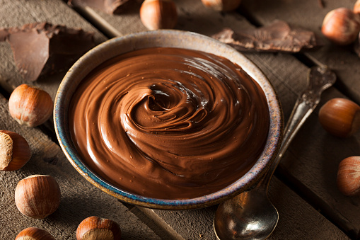 Homemade Chocolate Hazelnut Spread on a Background