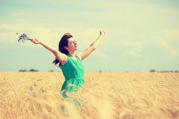 istock Woman enjoying the sun 518549079