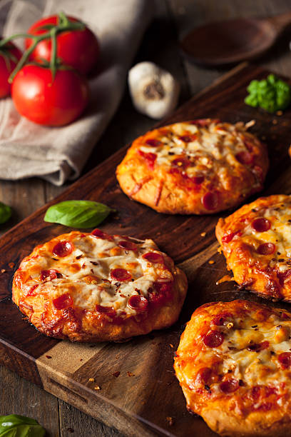 istock Homemade Cheesy Pepperoni PIzza on a Biscuit 518549258