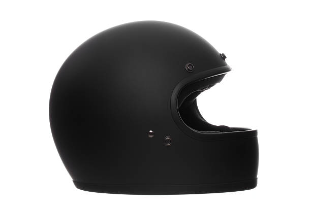 flat or matte black motorcycle helmet isolated on white