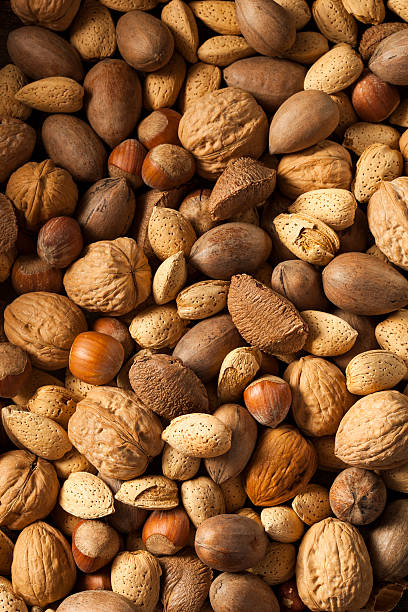 istock Assortment of Whole Raw Mixed Nuts 518549805
