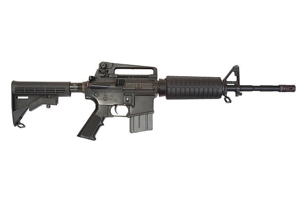 istock US Army carbine M4 isolated on a white background 518551099