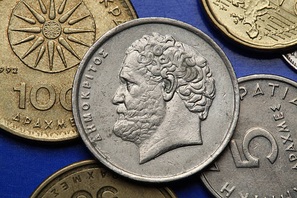 Coins of Greece Coins of Greece. Greek philosopher Democritus depicted in the old Greek 10 drachma coin. ancient coins of greece stock pictures, royalty-free photos & images
