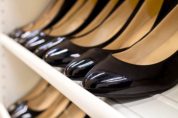 istock Leather shoes on shelf 518557184